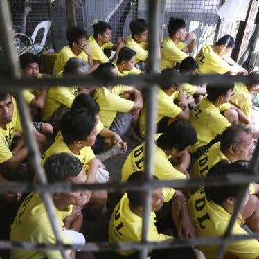 Inmates sitting in an overcrowded jail in Manila, Philippines, February 2019. 